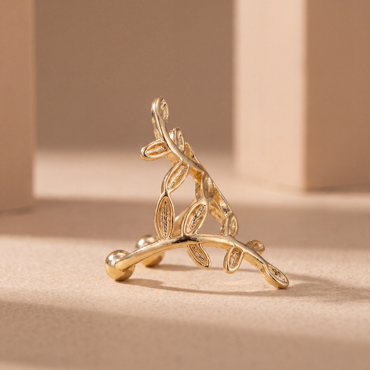 Laurel Vine gold plated ear cuff worn along the upper ear cartilage