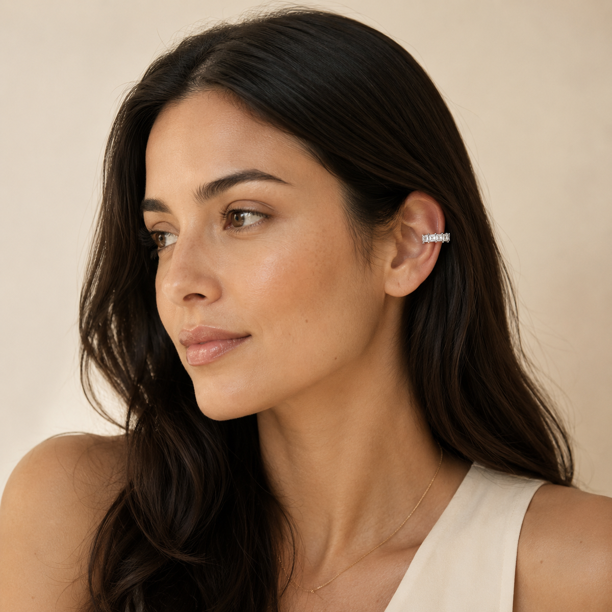Candy Cube clear cubic zirconia ear cuff worn on the upper ear