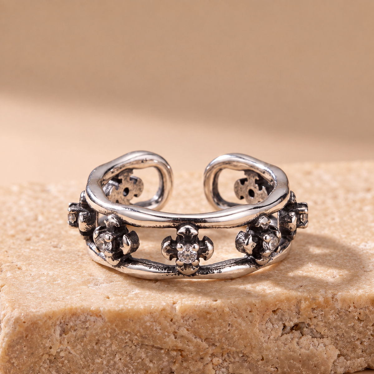 Wildflower oxidised silver flower ear cuff worn on the upper ear