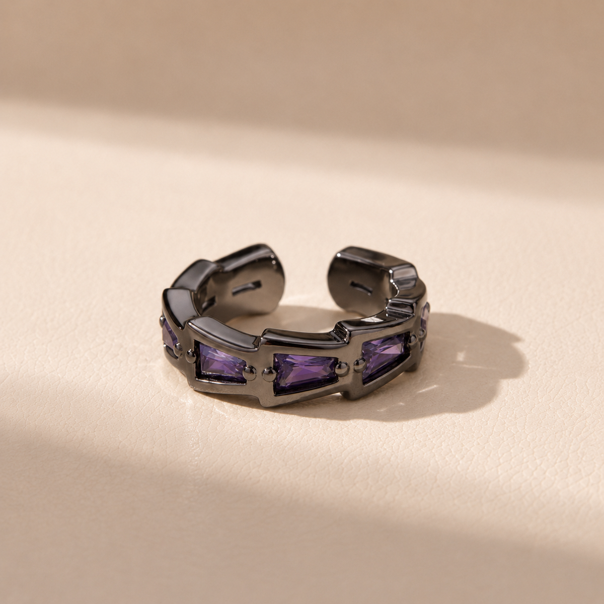 Baguette Line black tone ear cuff worn on the ear, close-up