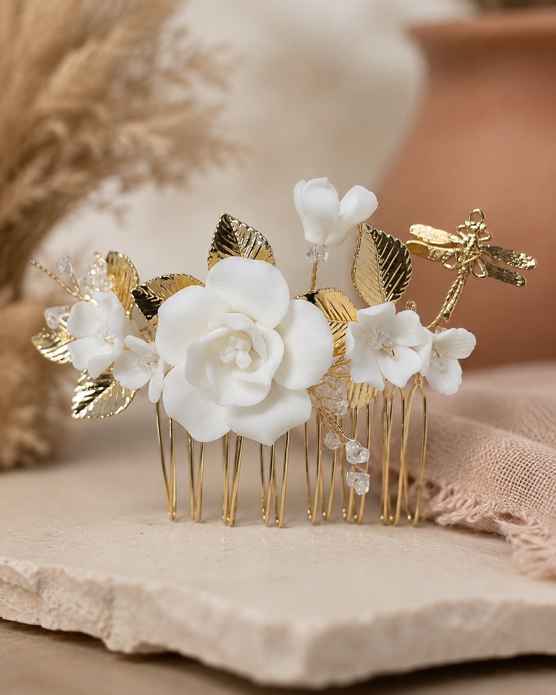 Ceramic flower hair comb with gold finish leaves and crystal accents