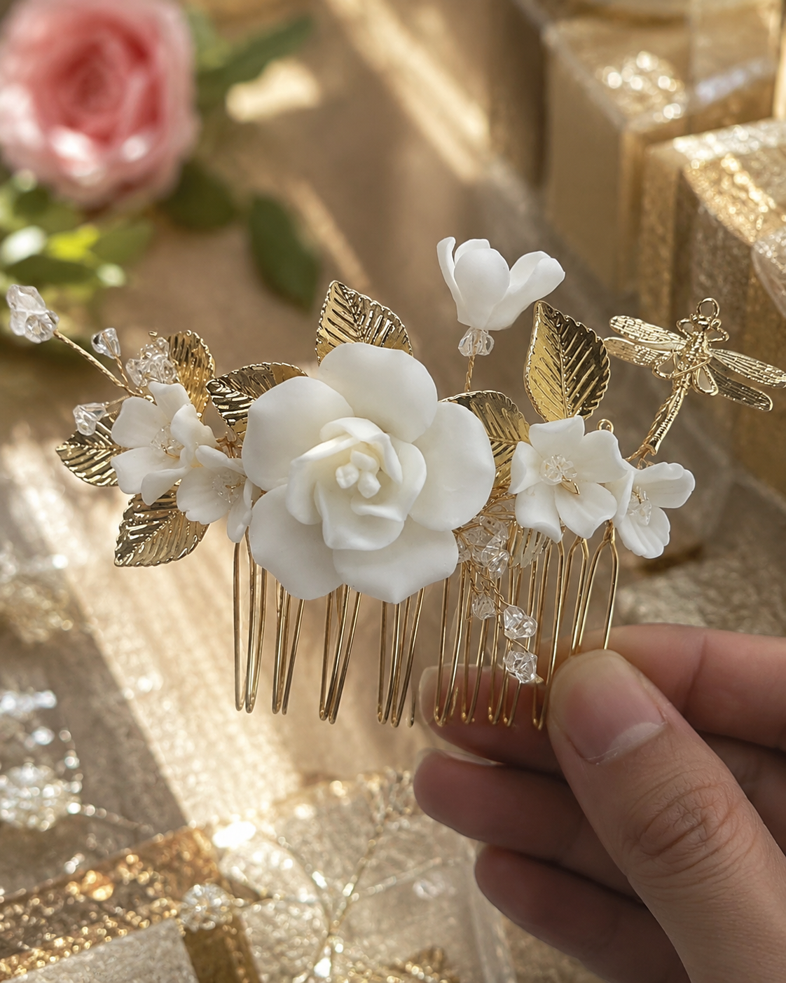 Close up of the handcrafted white ceramic blooms on the comb