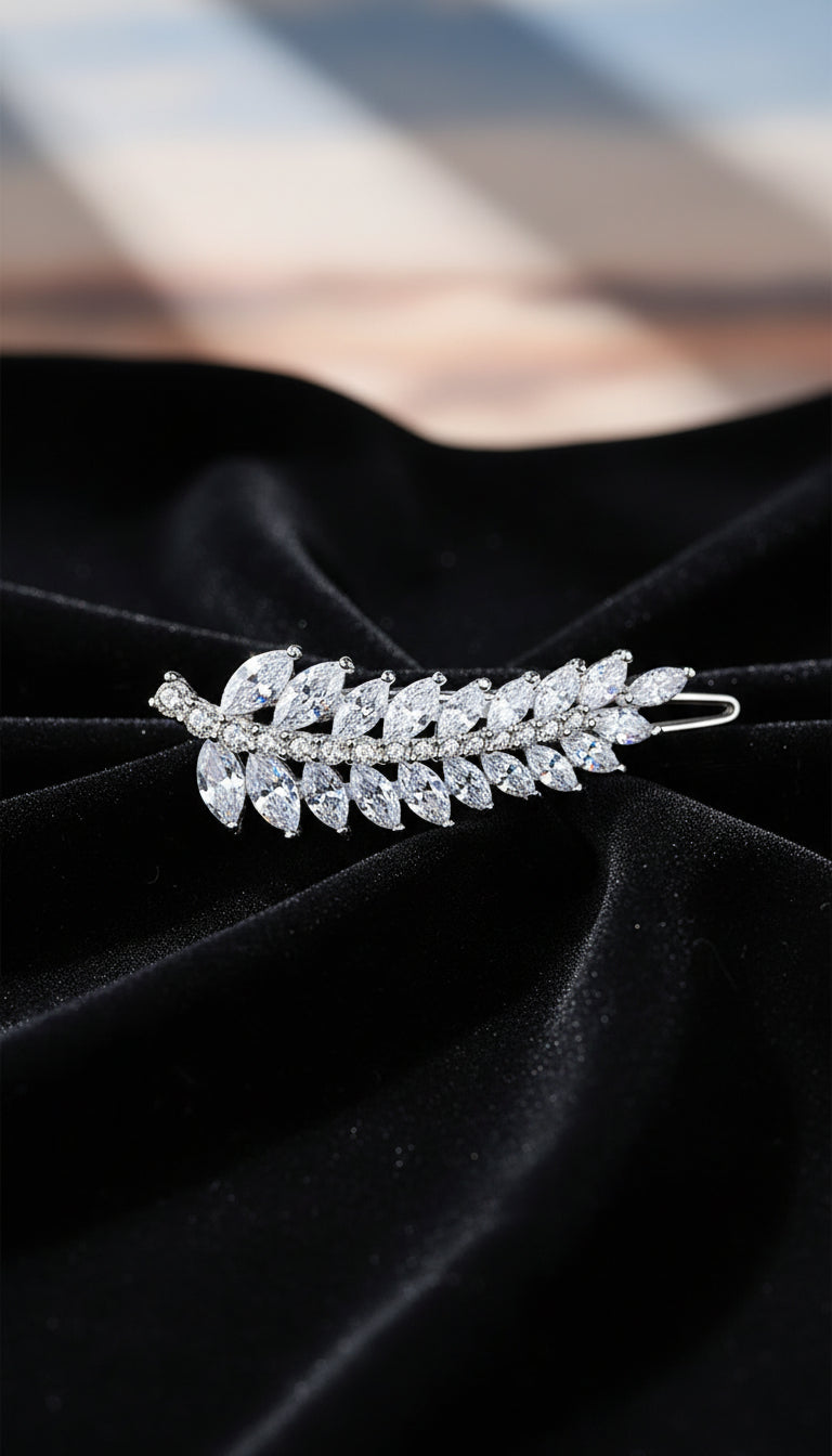 Sterling silver leaf hair pin styled as a bridal hair accessory