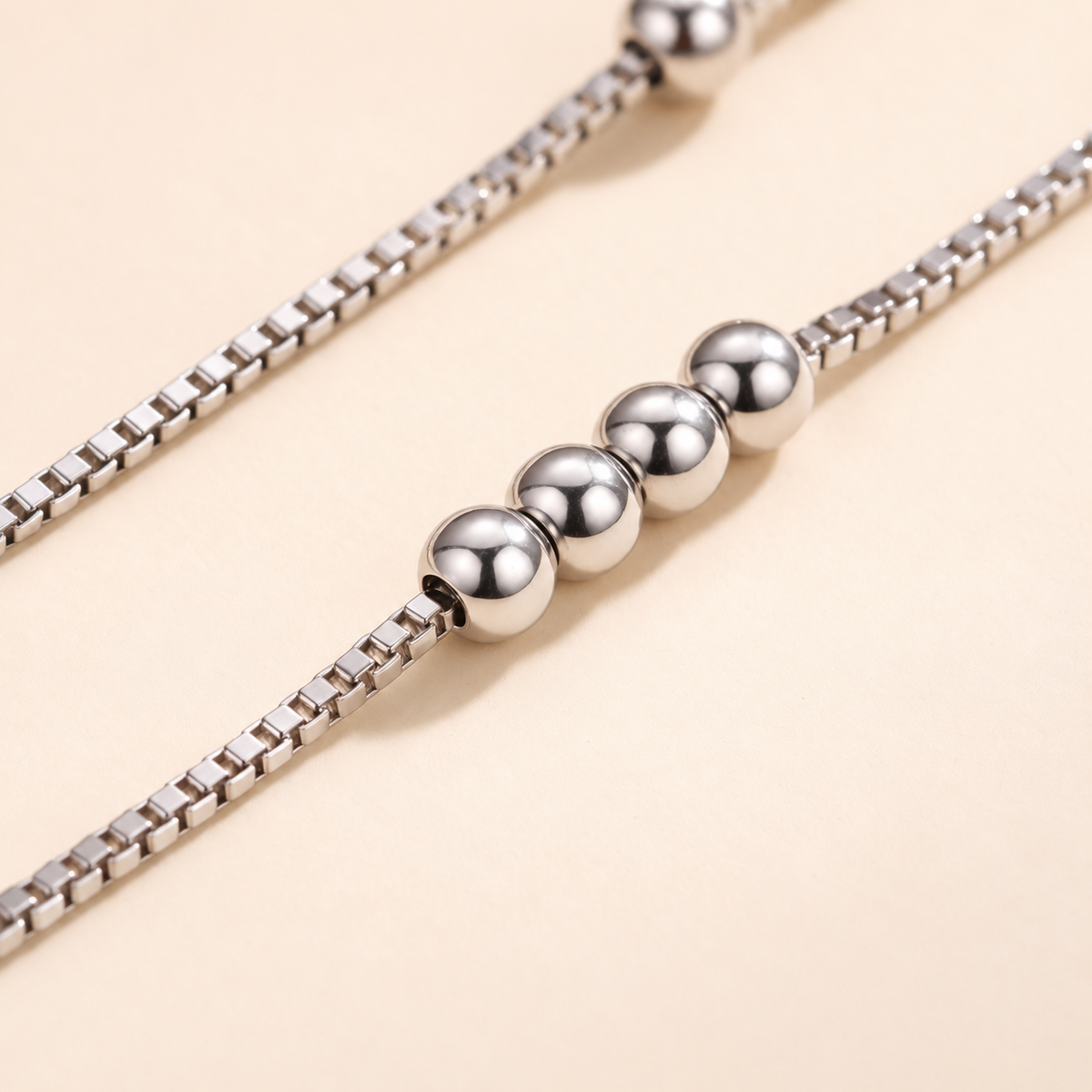 Juliet layered moissanite heart necklace laid flat in a full circle, showing both silver chains, lobster clasp, extender and S925 heart tag